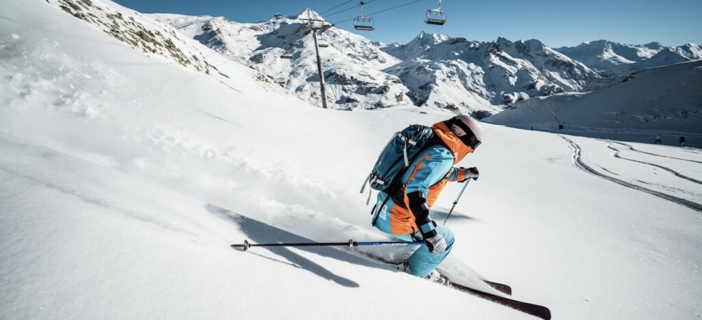 Oxygène instructor skiing off-piste in Tignes.